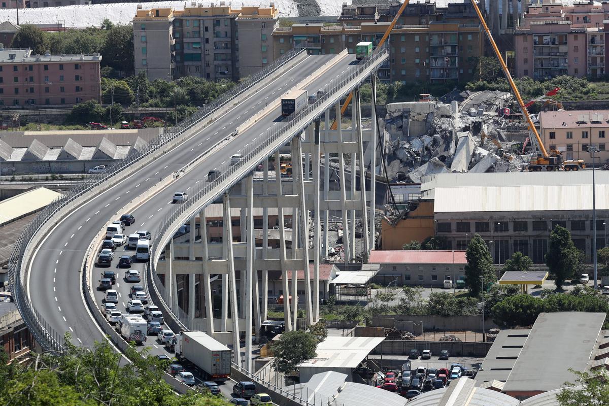 The collapsed Morandi Bridge in the Italian port city of Genoa, Italy on Aug. 16, 2018. (Reuters/Stefano Rellandini)