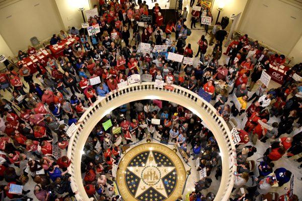 Teachers pack the state Capitol rotunda to capacity, on the second day of a teacher walkout, to demand higher pay and more funding for education, in Oklahoma City, Okla., on April 3, 2018. (Reuters/Nick Oxford)