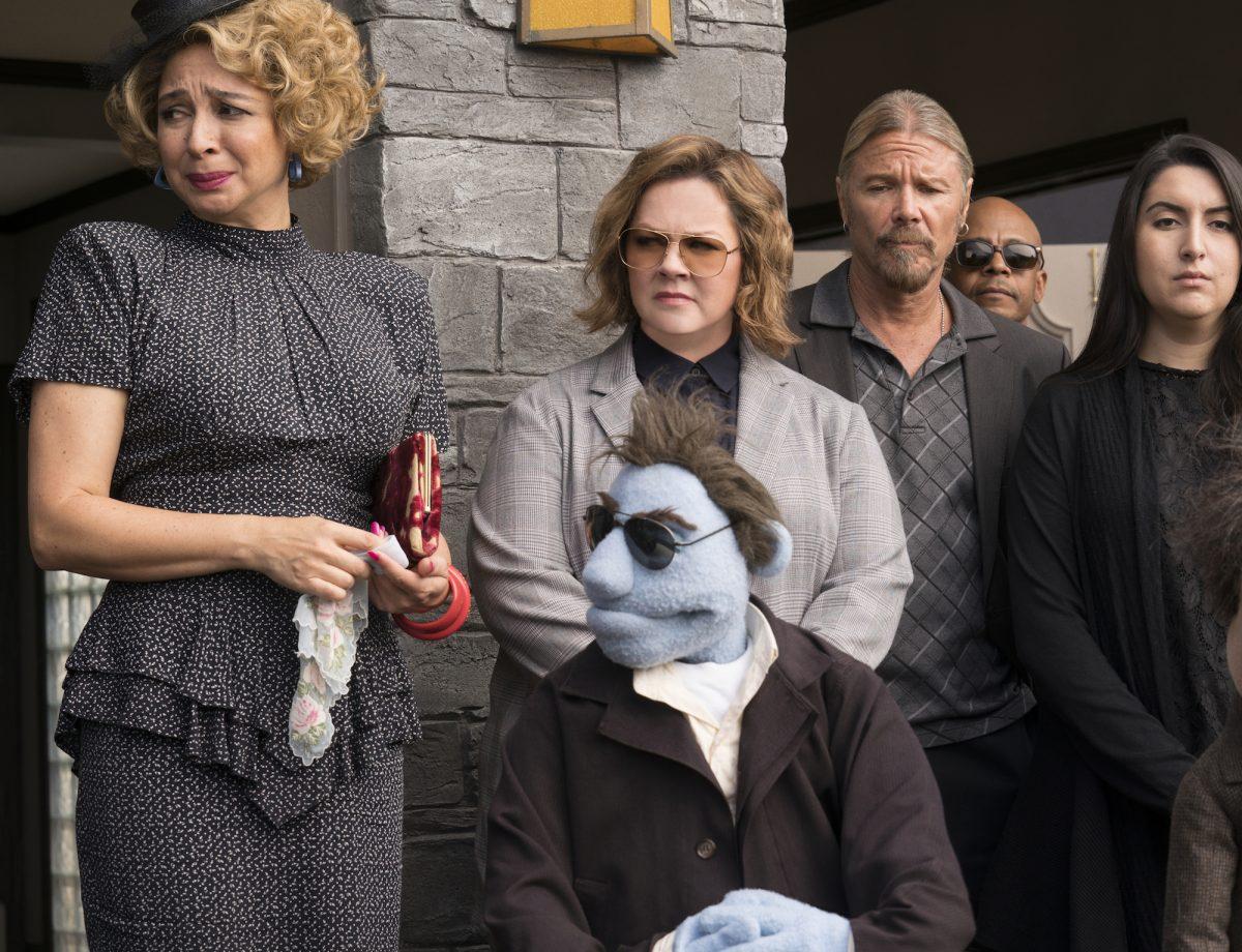 Maya Rudolph (L) and Melissa McCarthy (C) star in “The Happytime Murders.” (Hopper Stone/Motion Picture Artwork/STX Financing, LLC)