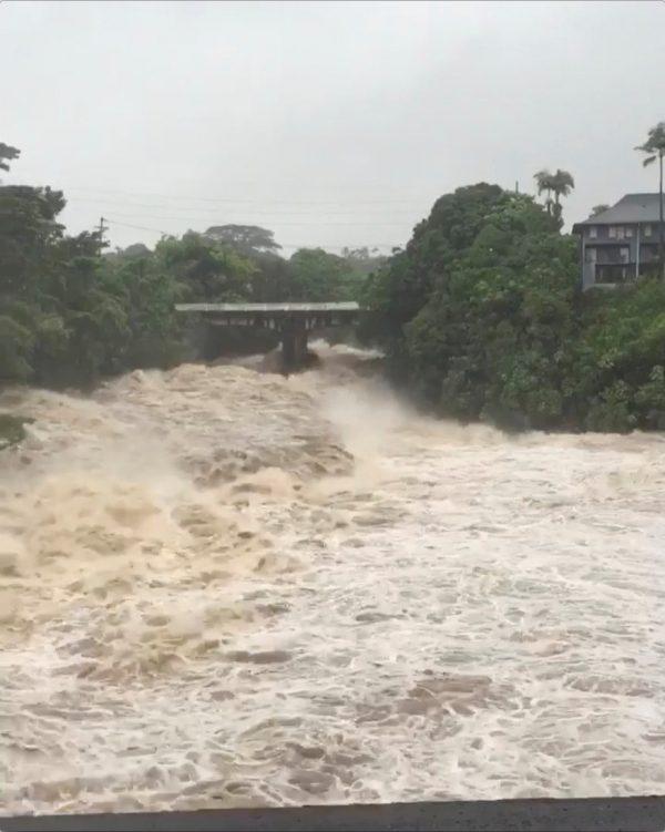 Choppy waters of the Wailuku river is seen in Hilo, Hawaii, U.S. Aug. 23, 2018 in this still image from video obtained from social media. (Hawaii Electric Light/via Reuters)