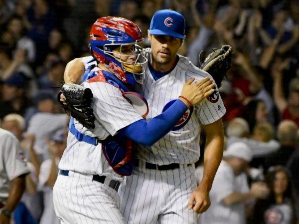 Chicago Cubs starting pitcher Cole Hamels (35) and Chicago Cubs catcher Victor Caratini (7) hug after the game against the Cincinnati Reds at Wrigley Field. The Chicago Cubs won 7-1 and Hamels pitched a complete game. (Matt Marton/USA Today Sports)