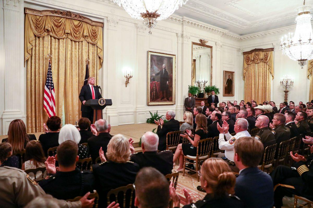 President Donald Trump participates in the Salute to the Heroes of Immigration and Customs Enforcement and Customs and Border Protection in the East Room at the White House in Washington on Aug. 20, 2018. (Samira Bouaou/The Epoch Times)