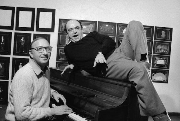 Neil Simon (left) and actor James Coco pose for a photo in New York during the New York announcement of a Broadway bound musical comedy, "Little Me". On Nov. 23, 1981. (AP/Lederhandler)