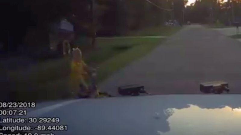 The Hancock County Sheriff’s Office in Mississippi released video footage of a K-9 vehicle striking a 7-year-old girl on a bike to show that the incident was an accident. (Hancock County Sheriff's Office)