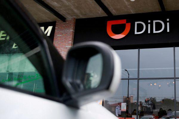 The logo of Chinese ride-hailing firm Didi Chuxing is seen at their new drivers center in Toluca, Mexico, on April 23, 2018. (Reuters/Carlos Jasso).