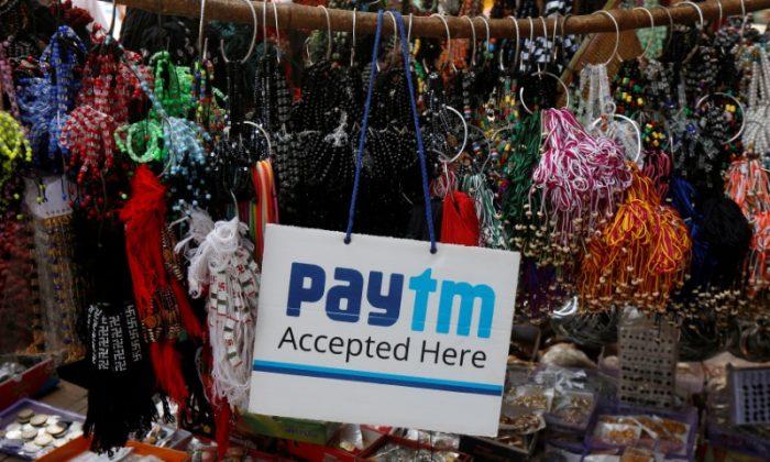 Jack Ma’s Antfin Pares Stake in Contentious Paytm