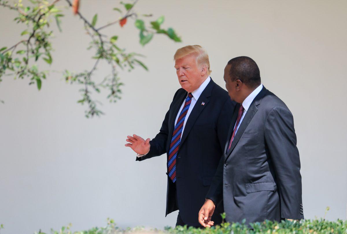 President Donald Trump and the President of the Republic of Kenya, Uhuru Kenyatta, walk along the colonnade of the White House in Washington on Aug. 27, 2018. (Samira Bouaou/The Epoch Times)
