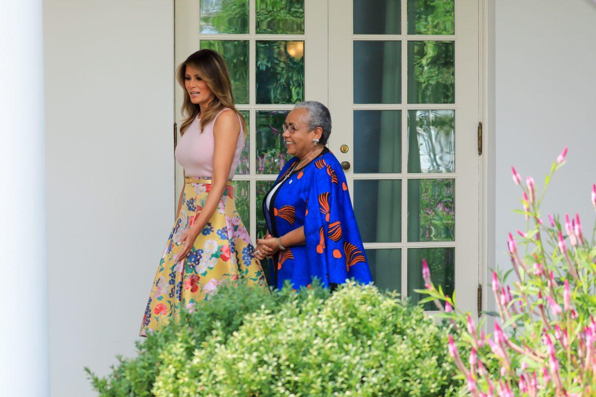 First Lady Melania Trump and Mrs. Margaret Kenyatta walk along the colonnade of the White House in Washington on Aug. 27, 2018. (Samira Bouaou/The Epoch Times)
