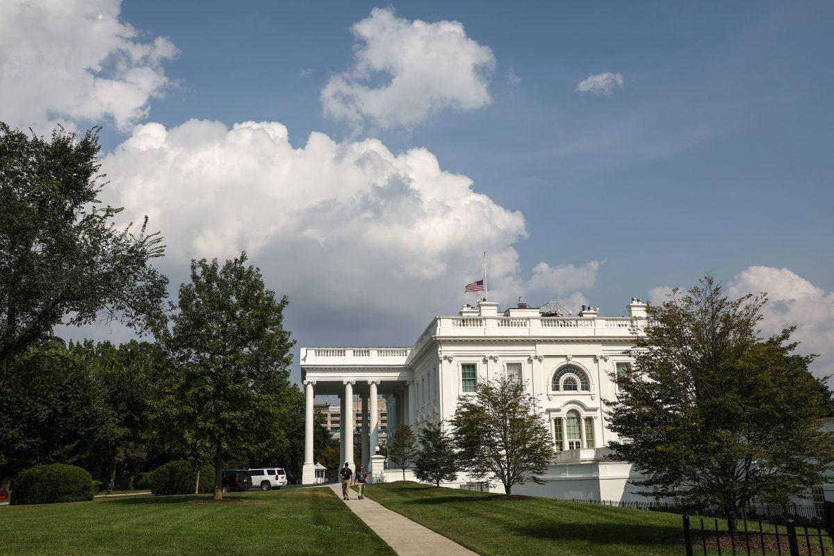 The flag at the White House is back to half-staff on the afternoon of Aug. 27, 2018. The flag had been put at half-staff over the weekend after Sen. John McCain died on Aug. 25. It was back to full-staff on the morning of Aug. 27, but lowered again mid-afternoon. (Samira Bouaou/The Epoch Times)