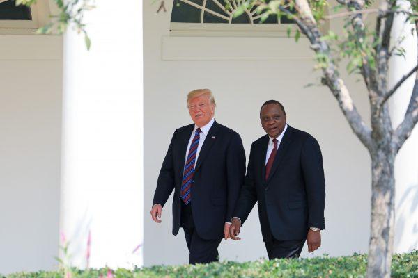 President Donald Trump and Kenyan President Uhuru Kenyatta walk along the colonnade of the White House in Washington on Aug. 27, 2018. (Samira Bouaou/Epoch Times)