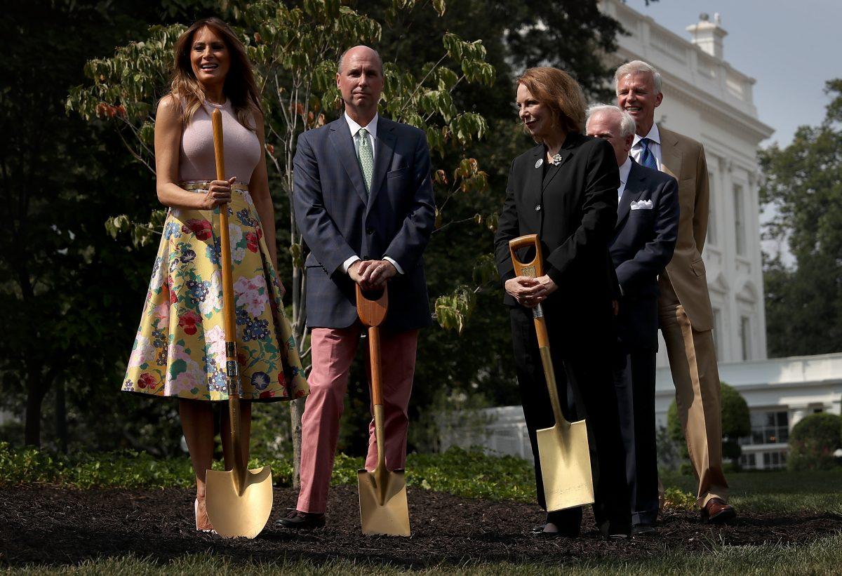 First lady Melania Trump (L) takes part in a tree planting ceremony on the south grounds of the White House on Aug. 27, 2018. Joining the first lady is Mary Jean Eisenhower (C), granddaughter of President Dwight Eisenhower and Richard Gatchell Jr. (2nd L), fifth generation grandson of President James Monroe. (Win McNamee/Getty Images)