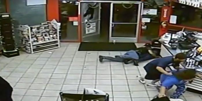Video: Firefighter in a Store Shields Woman From Gunfire