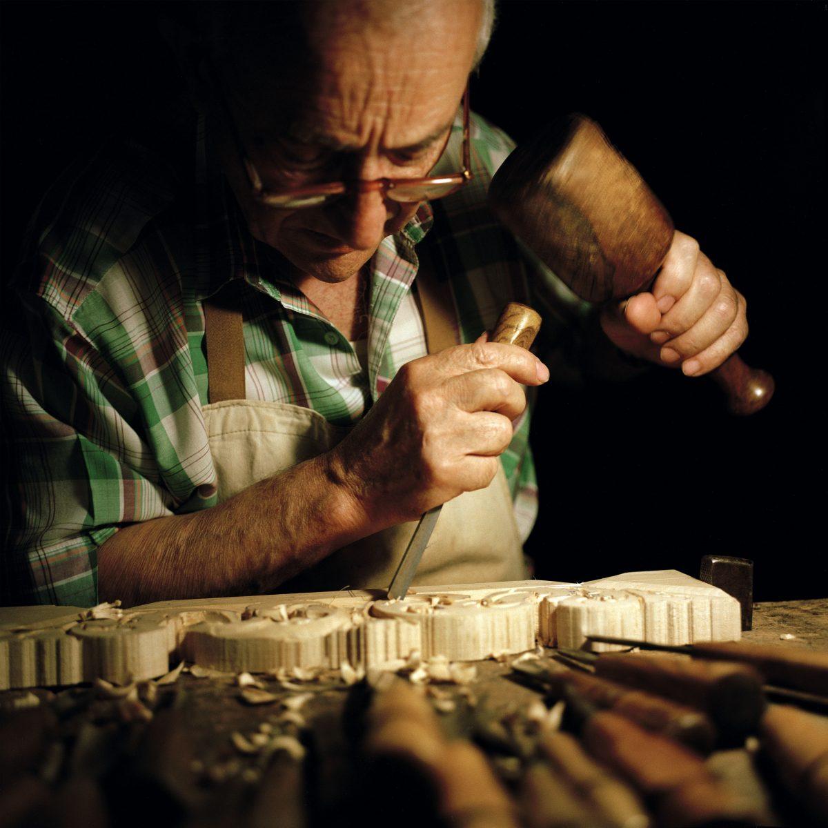 Master woodcarver Bruno Barbon has been skillfully wielding his hammer and chisel for over 50 years, making and restoring everything from ornaments to furniture. (Susanna Pozzoli/Michelangelo Foundation for Creativity and Craftsmanship)