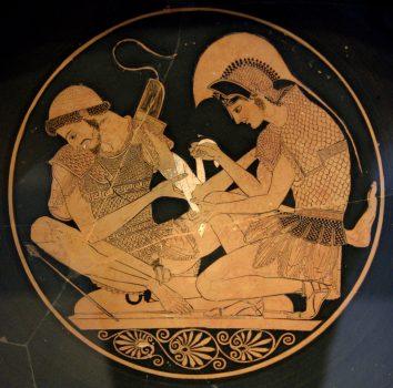 Detail on vase of Achilles tending Patroclus wounded by an arrow, by the potter Sosias circa 500 B.C., from the Etruscan city of Vulci. Akhilleus Patroklos Antikensammlung Berlin. (Public Domain)