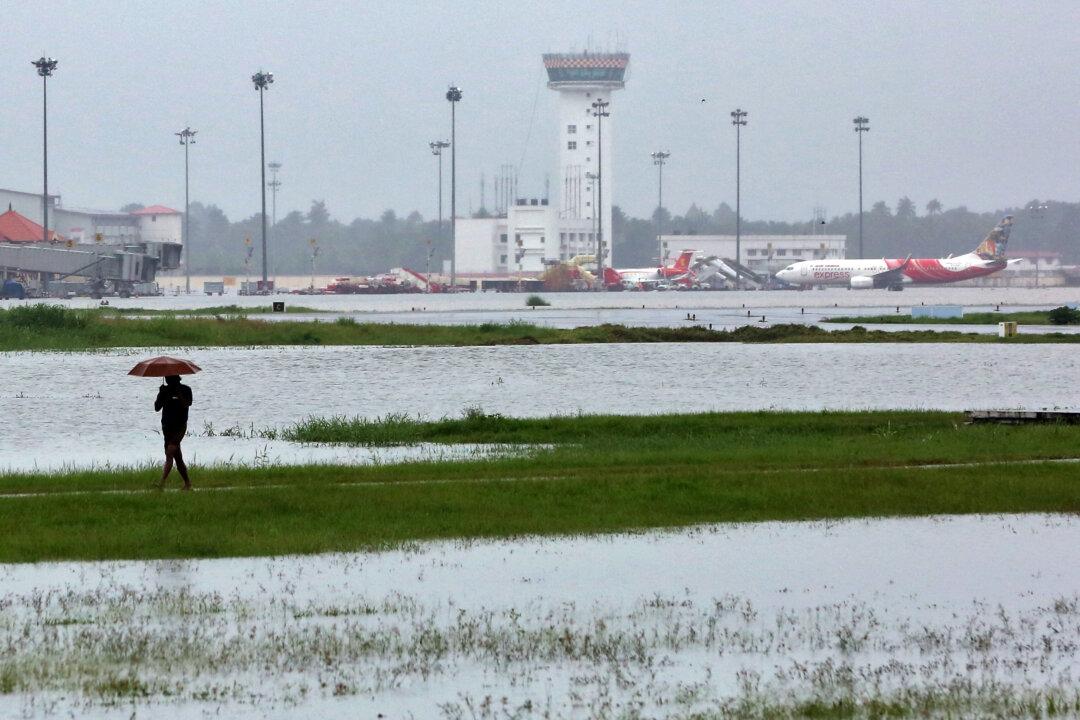 Tourism in India’s Kerala Left Mud-Bound by Devastating Floods
