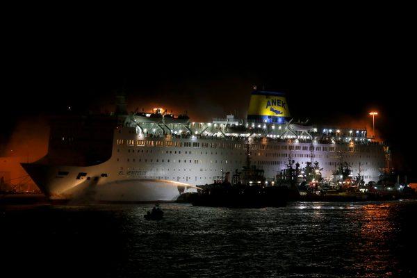 A firefighting vessel tries to extinguish a fire on the Eleftherios Venizelos ferry, at the port of Piraeus, Greece, August 29, 2018. (Reuters/Alkis Konstantinidis)