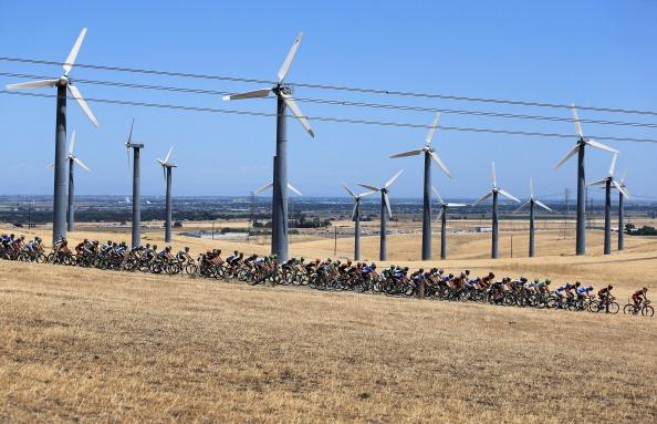 The peloton passes by windmills during Stage Seven of the 2013 Amgen Tour of California from Livermore to Mount Diablo in Alameda County, Calif. on May 18, 2013. (Doug Pensinger/Getty Images)