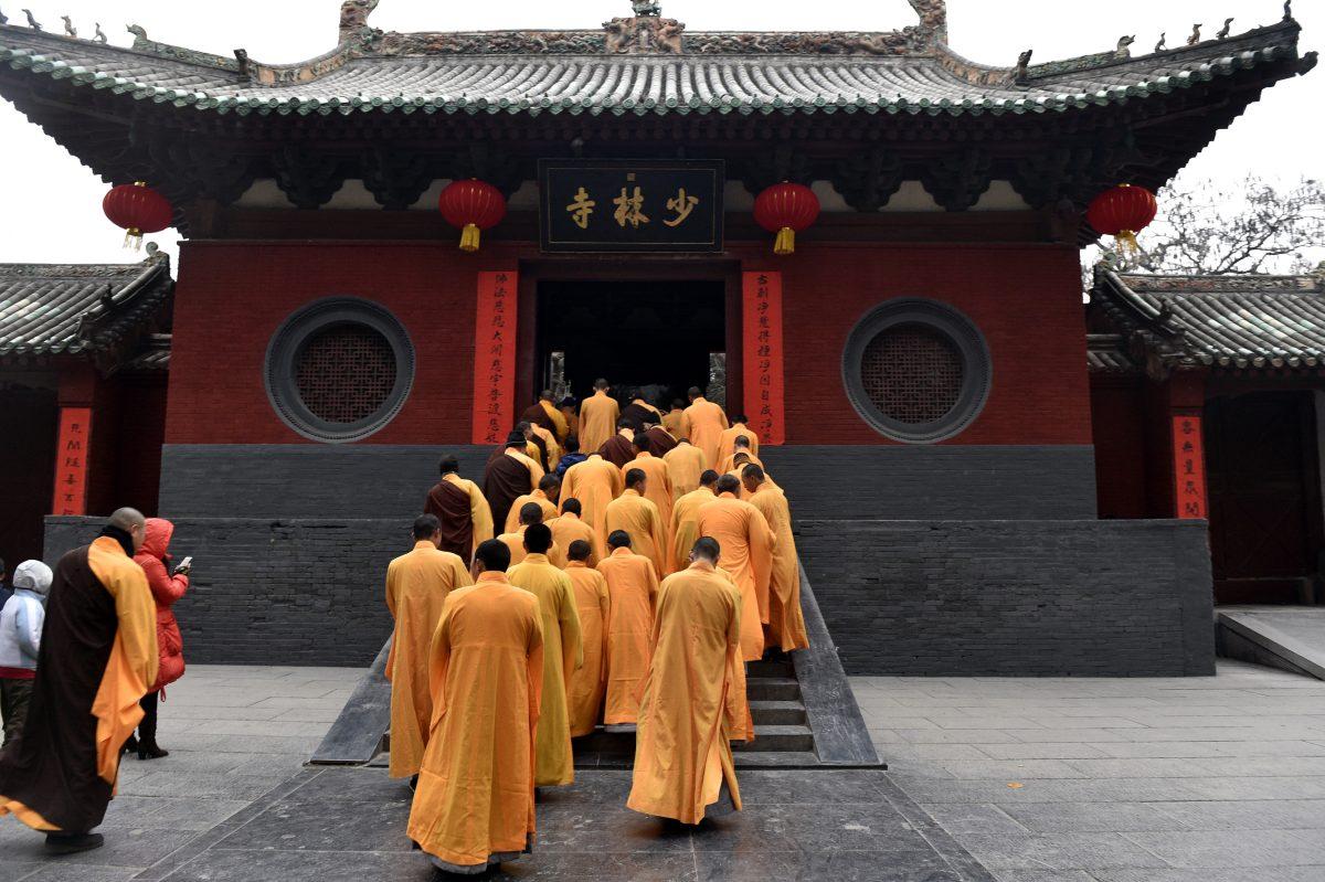 Chinese monks attend a ceremony at Shaolin Temple to celebrate the Lunar New Year in Dengfeng County, Henan Province, China, on Jan. 28, 2017. (STR/AFP/Getty Images)