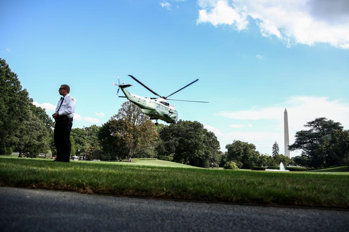 President Donald Trump departs aboard Marine One from the White House for a Make America Great Again Rally in Evansville, Ind., on Aug. 30, 2018. (Samira Bouaou/The Epoch Times)