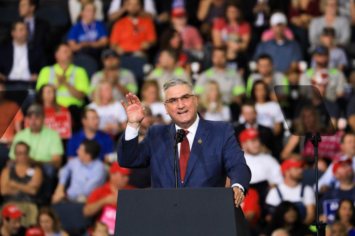 Indiana Gov. Eric Holcomb speaks at a Make America Great Again rally in Evansville, Ind., on Aug. 30, 2018. (Charlotte Cuthbertson/The Epoch Times)