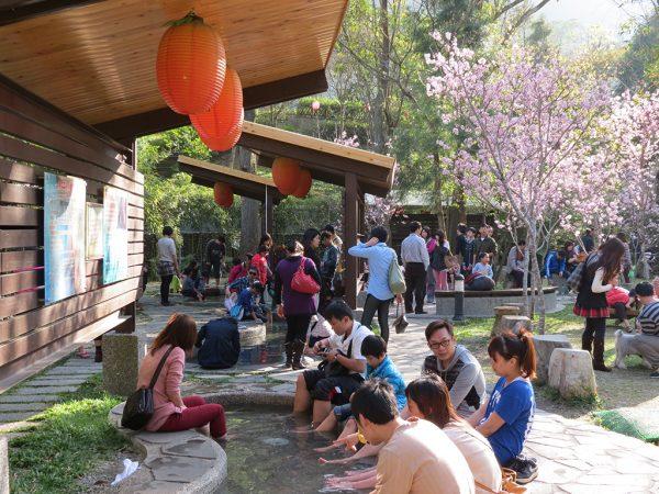 Visitors soak and relax their feet in Guguan’s hot-spring waters. (Courtesy of Taiwan Tourism Bureau)