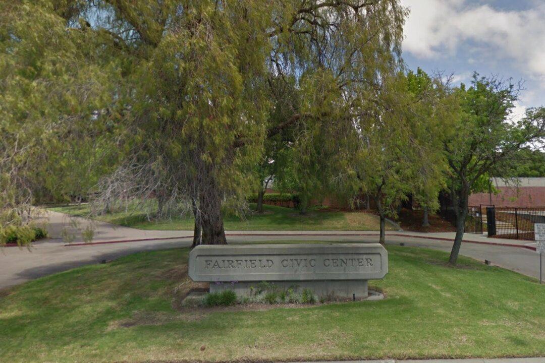 Woman Arrested in Connection With Possession of Firearm