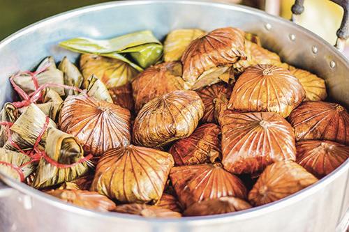 Besides its mud hot springs, Guanziling is known for its many dishes made from the lotus plant, like sticky rice wrapped in lotus leaves. (Courtesy of Taiwan Tourism Bureau)