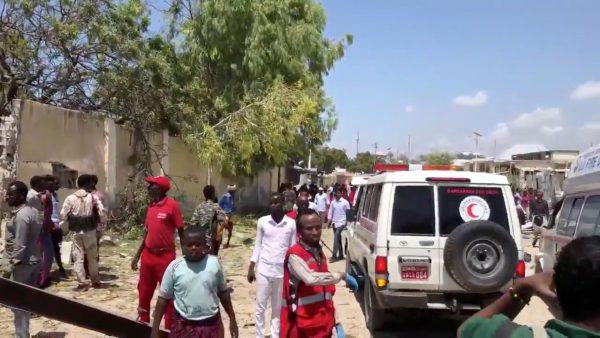 Emergency services work at the site of a blast in Mogadishu, Somalia, September 2, 2018 in this still image obtained from a social media video. (Munasar Mohamed/via Reuters)
