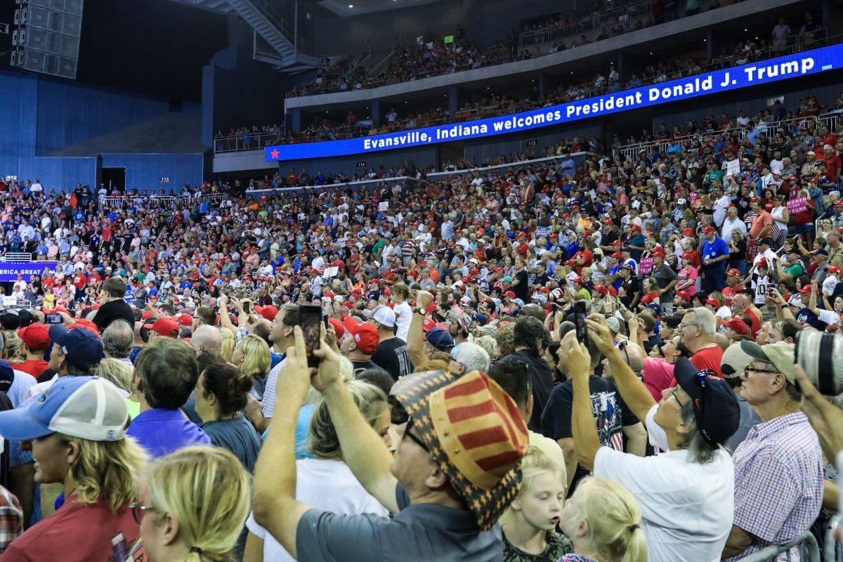 Audience members at a Trump rally in Evansville, Ind., on Aug. 30, 2018. (Charlotte Cuthbertson/The Epoch Times)