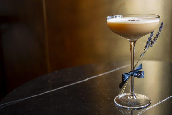 Darkness and Disgrace, with dark rum, tawny port, coffee liqueur, sugar syrup, and egg yolk. (Courtesy of Hotel Café Royal)