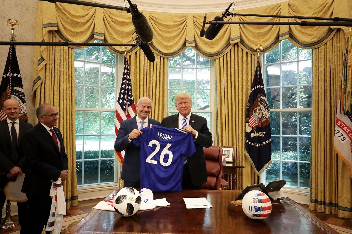 President Donald Trump and FIFA President Gianni Infantino pose for photographs in the Oval Office at the White House on Aug. 28, 2018. (Chip Somodevilla/Getty Images)