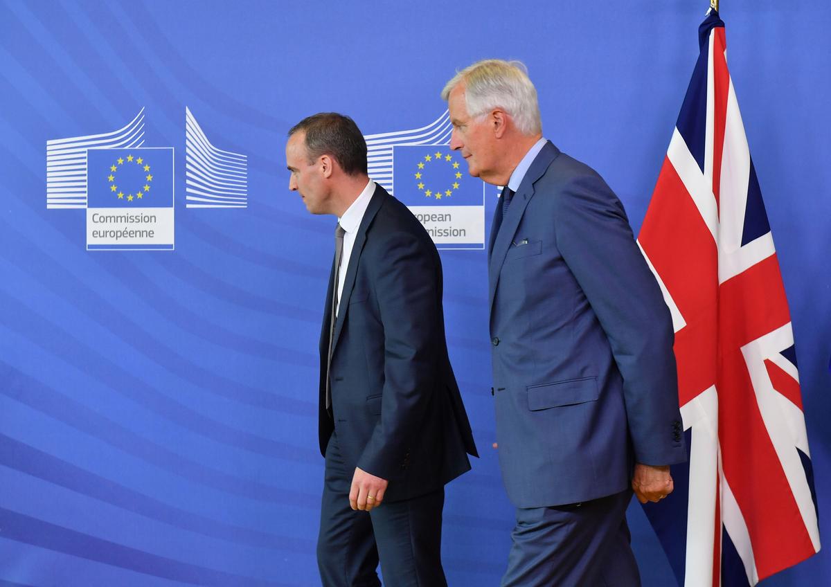 EU Chief Brexit Negotiator Michel Barnier (R) meets Britain's Brexit Secretary Dominic Raab at the European Commission in Brussels on Aug. 31, 2018. (Emmanuel Dunand/AFP/Getty Images)