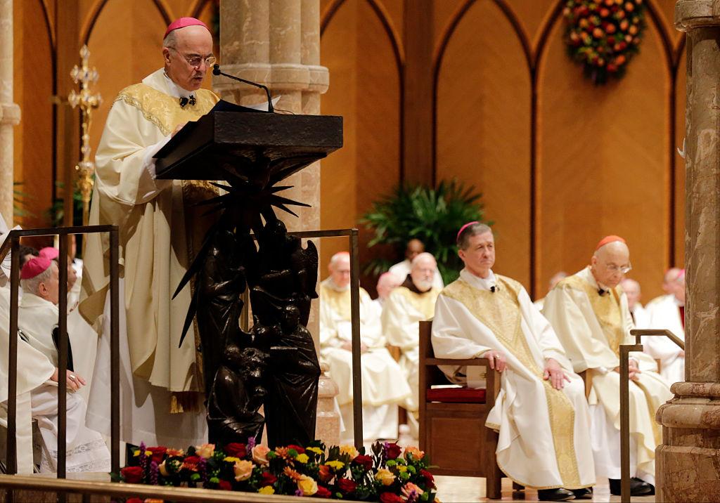 Archbishop Carlo Maria Viganò, the then-Apostolic Nuncio of the United States, reads the Apostolic Mandate during the Installation Mass of Archbishop Blase Cupich at Holy Name Cathedral in Chicago, on Nov. 18, 2014. (Charles Rex Arbogast-Pool/Getty Images)