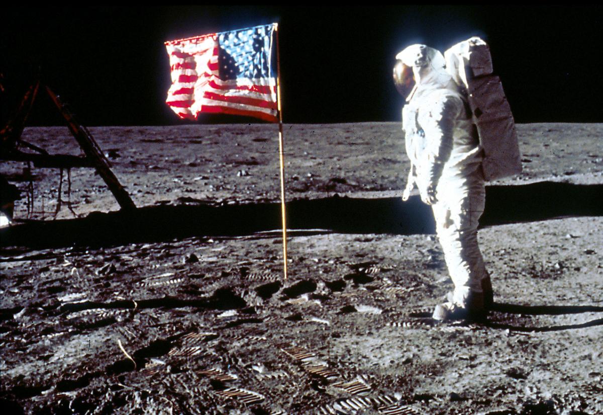 Astronaut Edwin "Buzz" Aldrin poses next to the U.S. flag on the moon during the Apollo 11 mission, on July 20, 1969 (NASA/Liaison)