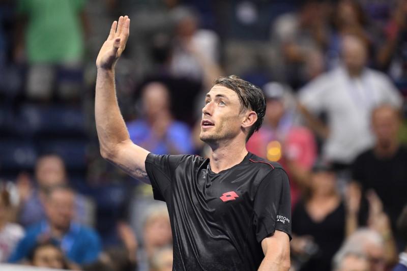 John Millman of Australia celebrates after defeating Roger Federer of Switzerland in a round of 16 match on day eight of the 2018 U.S. Open tennis tournament at USTA Billie Jean King National Tennis Center, on Sep. 3, 2018. (Danielle Parhizkaran/USA Today Sports/Reuters)