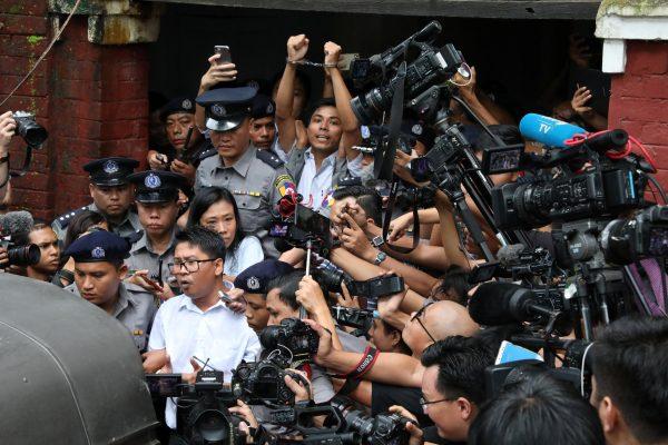 Detained Reuters journalists Wa Lone and Kyaw Soe Oo leave Insein court after listening to the verdict in Yangon, Myanmar on Sept 3, 2018. (Stringer/Reuters)