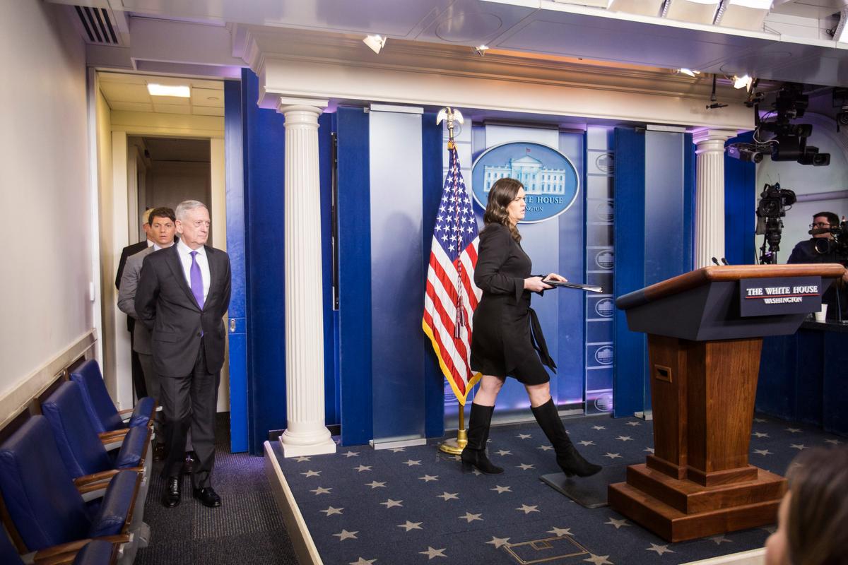 White House press secretary Sarah Huckabee Sanders and Secretary of Defense Jim Mattis arrive for a press briefing on Feb. 7, 2018. (Samira Bouaou/The Epoch Times)