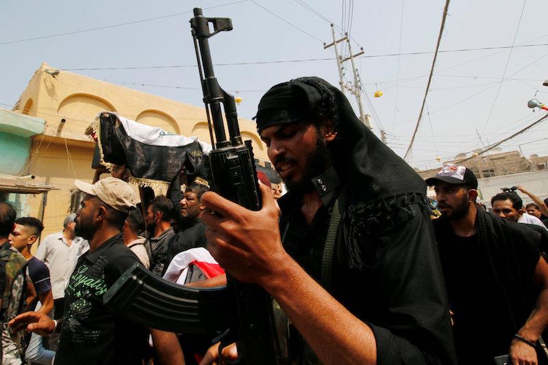 Mourners carry the coffin of a protester, who was killed in clashes with security forces in Basra, Iraq September 4, 2018. (Reuters/Essam al-Sudani)