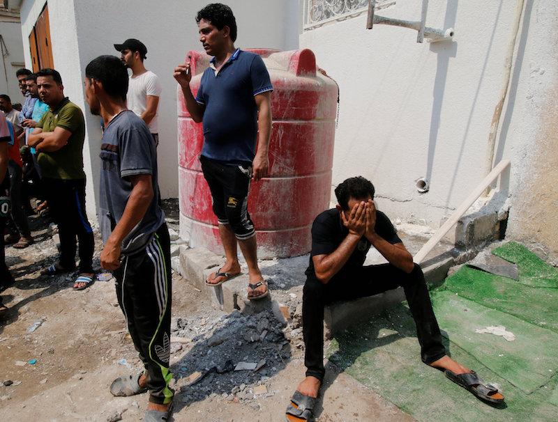 Mourners react during the funeral of a protester, who was killed in clashes with security forces in Basra, Iraq September 4, 2018. REUTERS/Essam al-Sudani