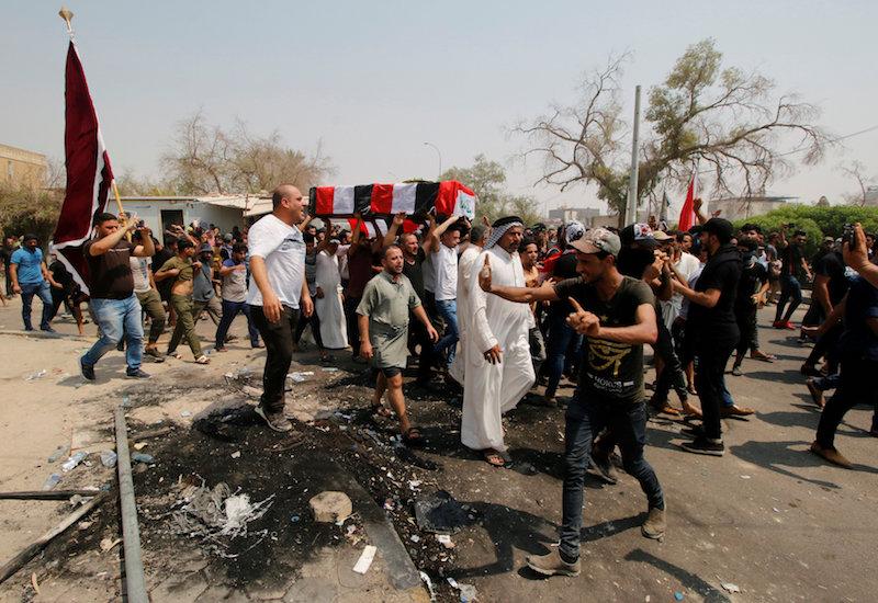 Mourners carry the coffin of a protester, who was killed in clashes with security forces in Basra, Iraq September 4, 2018. (Reuters/Essam al-Sudani)