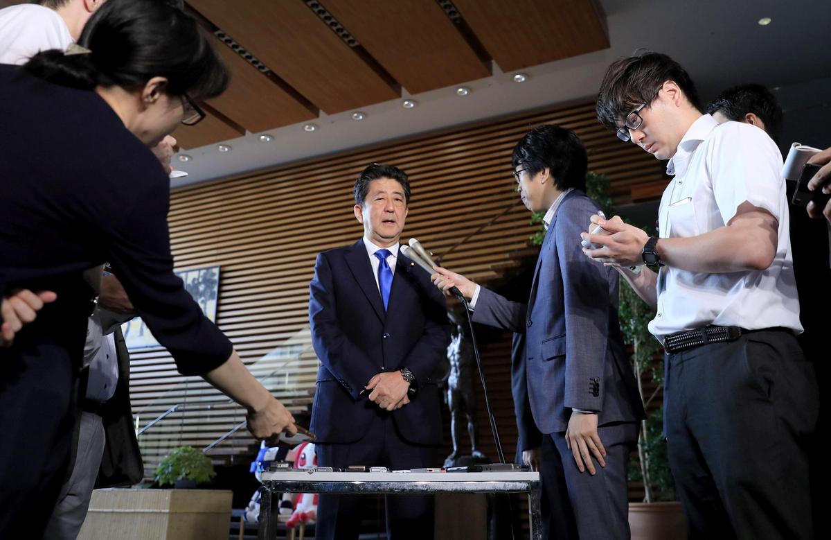 Japan's Prime Minister Shinzo Abe speaks to reporters after a powerful earthquake hit Japan's northern island of Hokkaido, at Abe's official residence in Tokyo, Japan, Sept. 6, 2018. (Kyodo/Reuters)