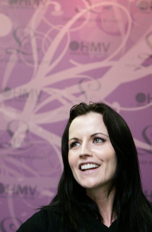 Irish singer Dolores O'Riordan poses during an autograph session to promote her new solo album in Hong Kong April 24, 2007. (Reuters/Paul Yeung/File Photo)