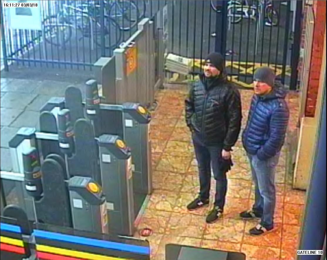 Boshirov (L) and Petrov are shown on CCTV at Salisbury train station on March 3, 2018. (Metropolitan Police)