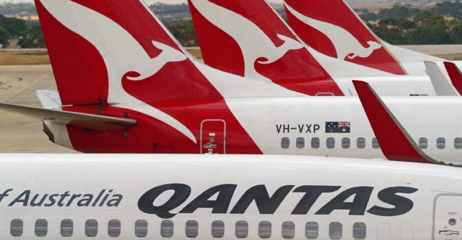 Qantas airplanes wait at Melbourne Tullamarine Airport in Melbourne, Australia on Feb. 25, 2014. (Scott Barbour/Getty Images)