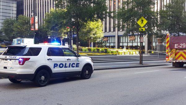 Cincinnati Police respond to shooting inside a bank in downtown, in this social media photo released in Cincinnati, Ohio on Sept. 6, 2018. (Courtesy Cincinnati Police Department/Handout via Reuters)