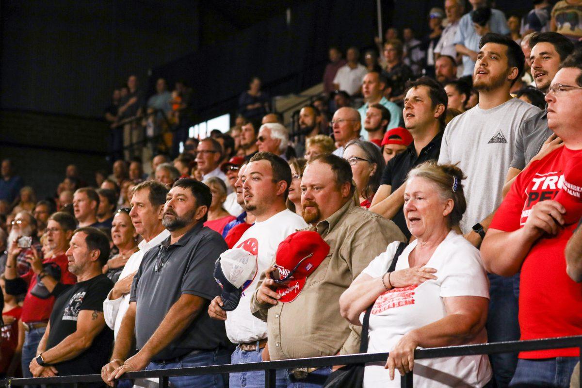 The audience recites the Pledge of Allegiance at President Donald Trump’s Make America Great Again rally in Billings, Mont., Sept. 6, 2018. (Charlotte Cuthbertson/The Epoch Times)