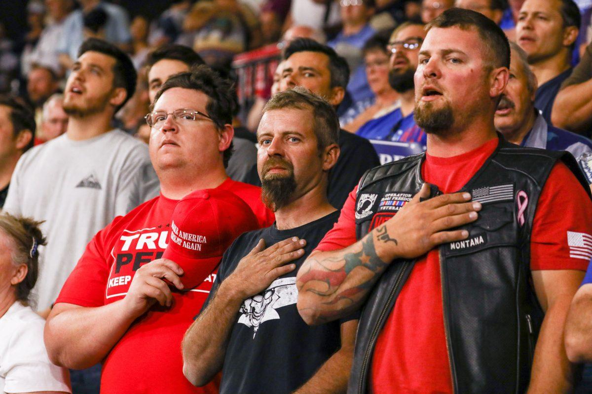 Audience members recite the Pledge of Allegiance at President Donald Trump’s Make America Great Again rally in Billings, Mont., Sept. 6, 2018. (Charlotte Cuthbertson/The Epoch Times)