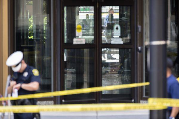 Police investigate the scene after a multiple fatality shooting at the Fifth Third Bank building on Fountain Square after a shooting with multiple fatalities on Sept. 6, 2018, in downtown Cincinnati. (AP)