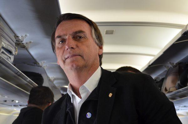 Brazilian presidential candidate Jair Bolsonaro on a flight between Porto Alegre and Brasília on Aug. 31, 2018. (Sarita Reed/Special to The Epoch Times)