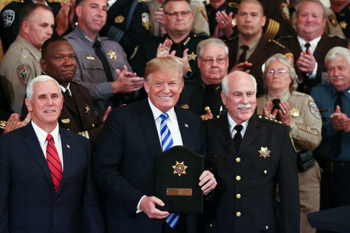 President Donald Trump and Vice President Mike Pence meet with sheriffs from across the country at the White House in Washington on Sept. 5, 2018. (Samira Bouaou/The Epoch Times)